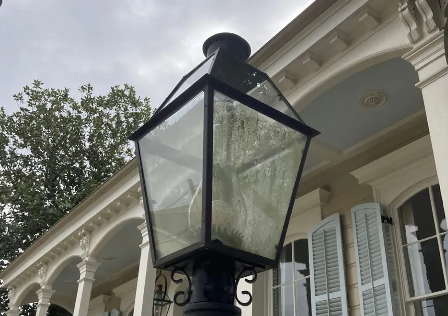 Gas lantern with dirty, cloudy glass before cleaning