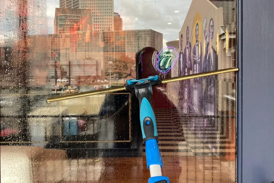 Commercial storefront window cleaning in New Orleans by Vivid Window Cleaning