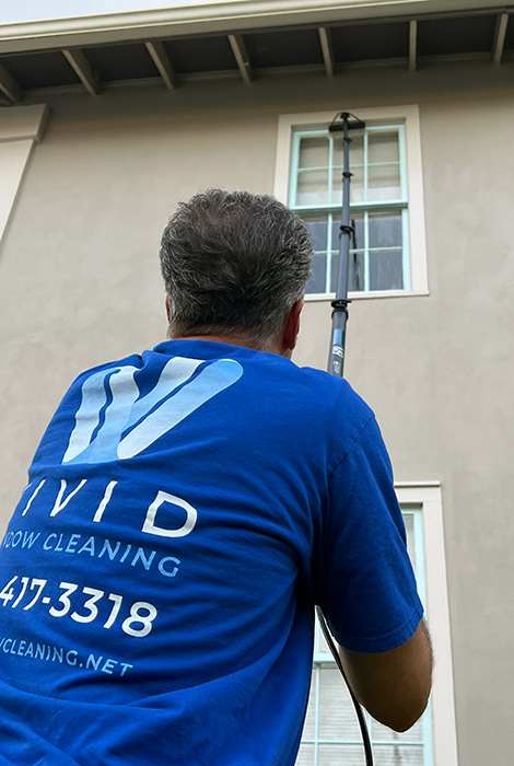 Darin from Vivid Window Cleaning washing windows